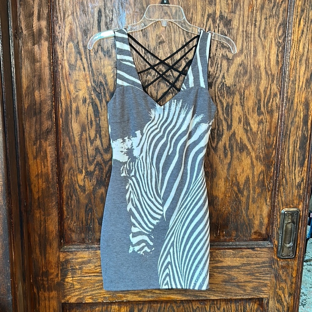 Zebra mini dress. Size xxs. Excellent pre owned condition. Bebe addiction
